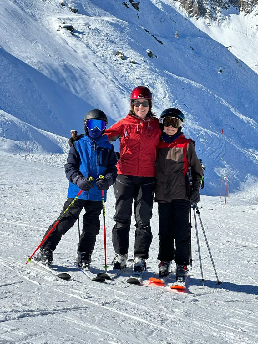 In the mountains with her sons.